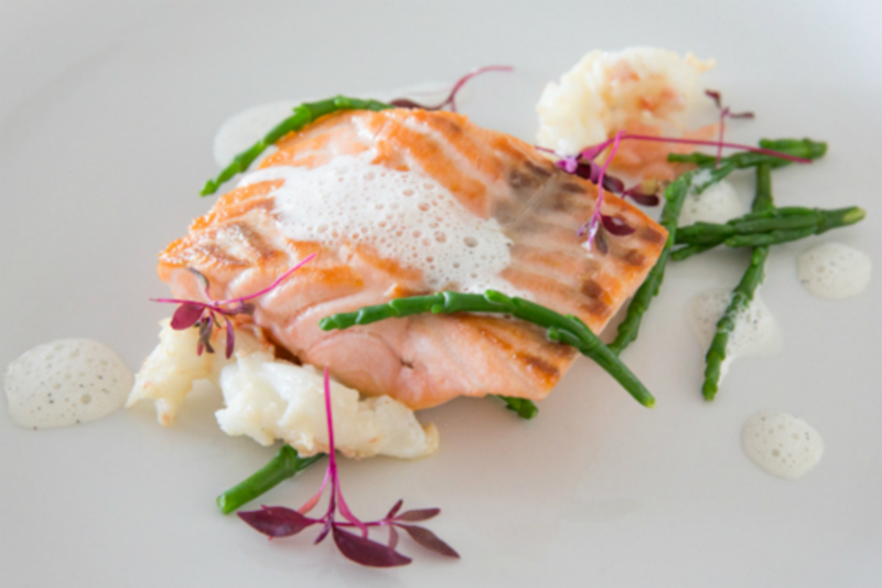 Wild Salmon Fillet, wilted Southport samphire, garlic saut&eacute;ed langoustines, Blackpool tomato caviar